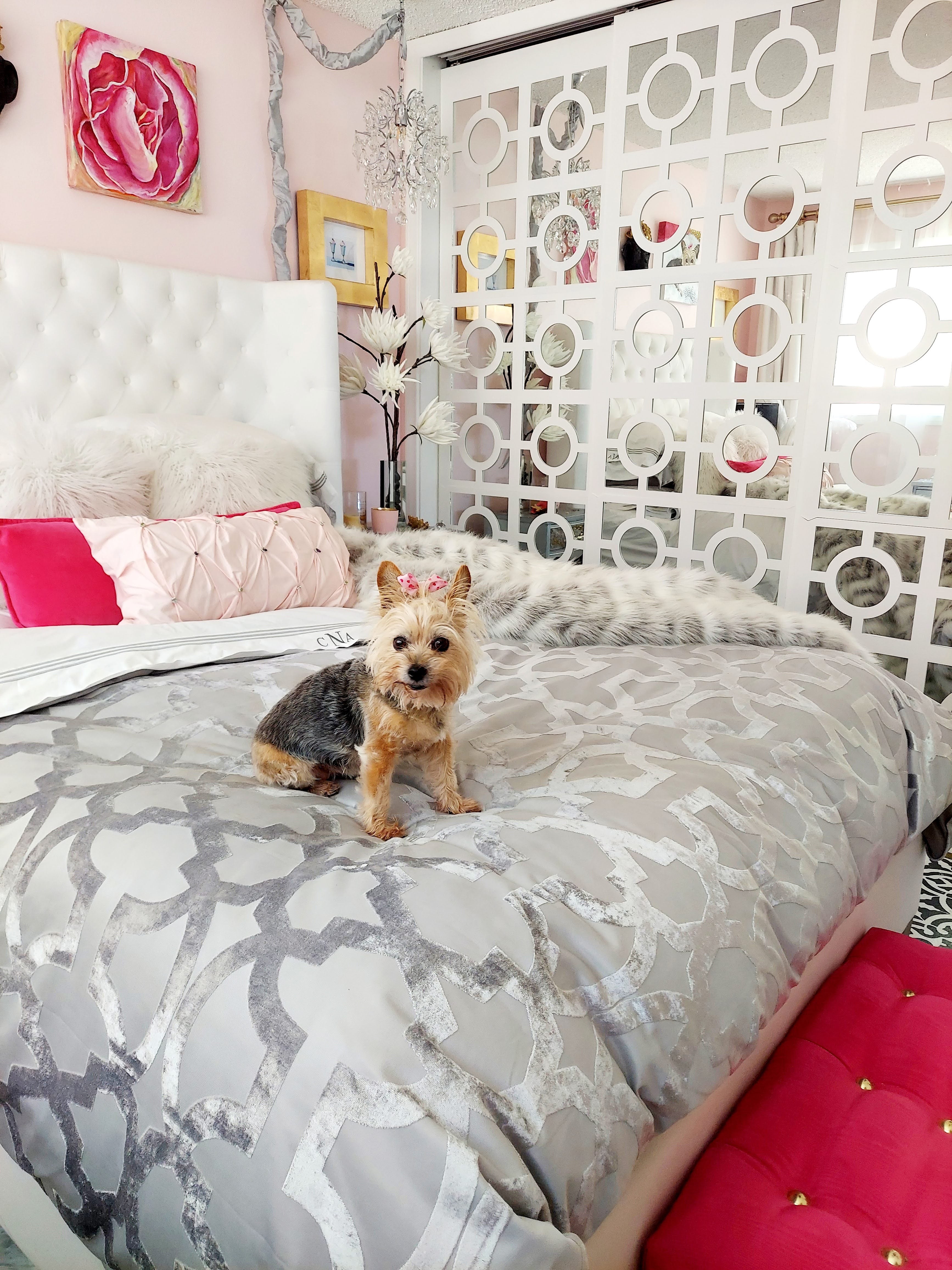 Bedroom - pink ottoman and styling detail